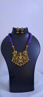 Purple thread necklace with Golden oxidised traditional pendant